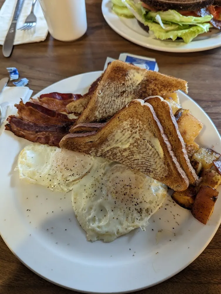Refs over Easy Toast Bacon and Home Fries